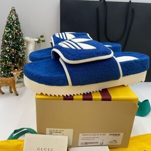 Men’s Gucci X Adidas, slide sandals size 11 made in Italy